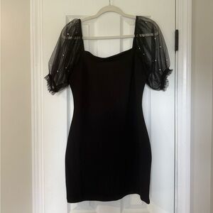 Elegant Black Dress with Sheer Sleeves